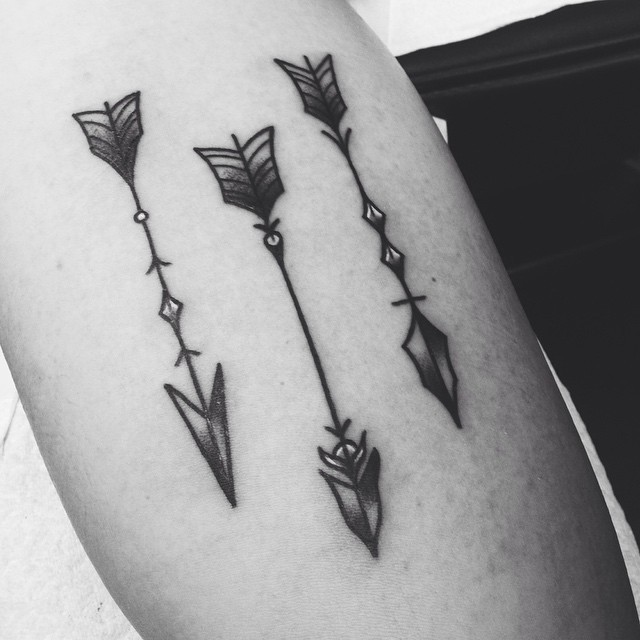 Triple black arrow tattoo with shadows for boys
