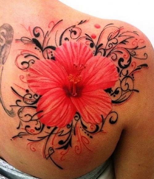 Tropical hibiscus flower tattoo on the shoulder