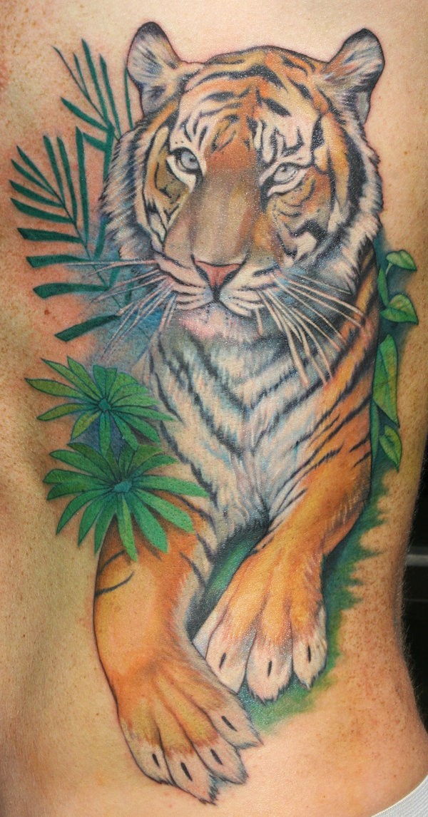 Tiger lying in thickets tattoo