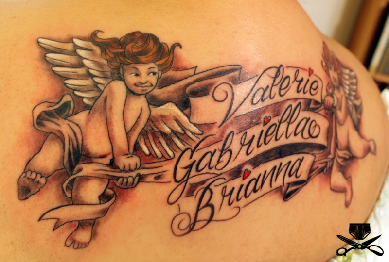 Two cherubs and an inscription with name of child tattoo
