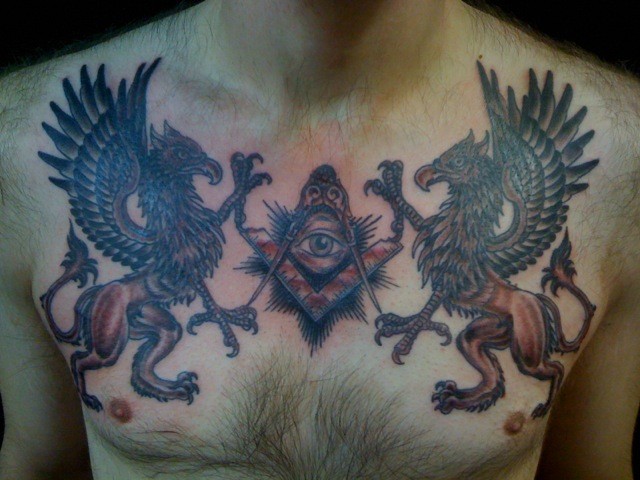 Two griffin ink painted tattoo on chest