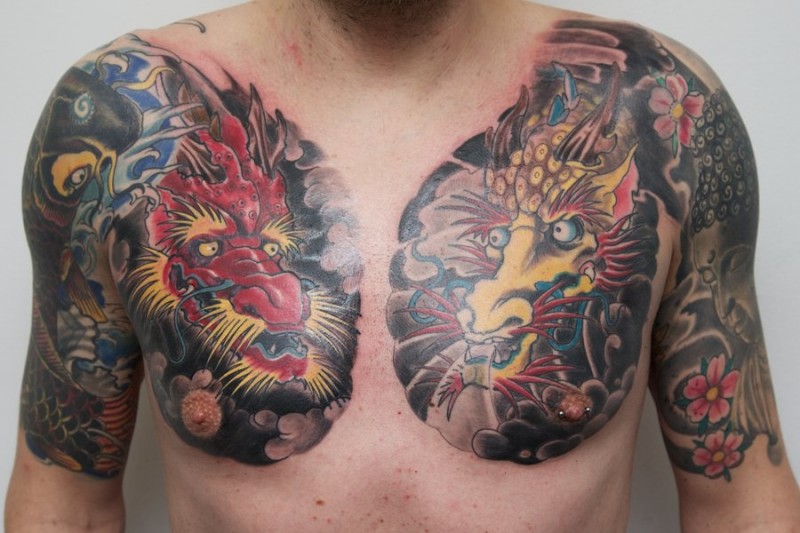 Two head dragon tattoo on chest by graynd