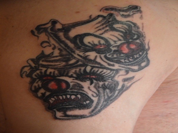 Two scary masks clown tattoo