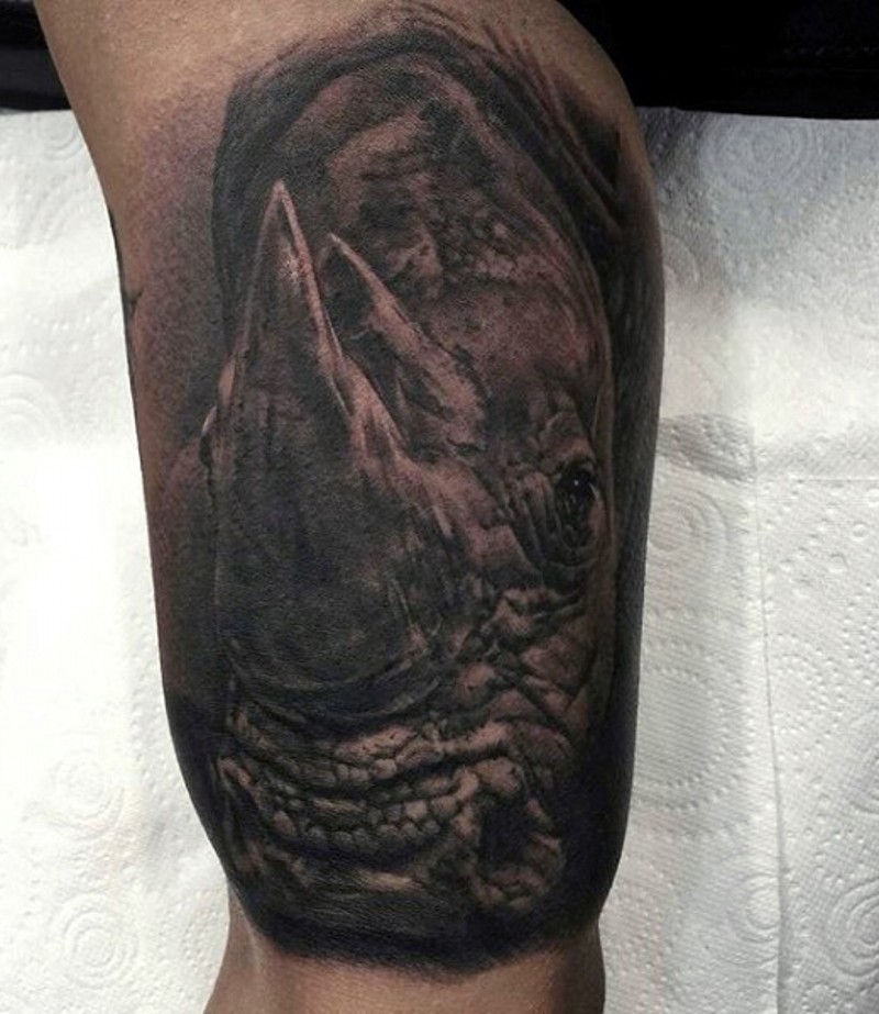 Typical 3D style arm tattoo of detailed rhino head