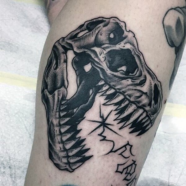 Typical black ink engraving style dinosaur skull with lettering