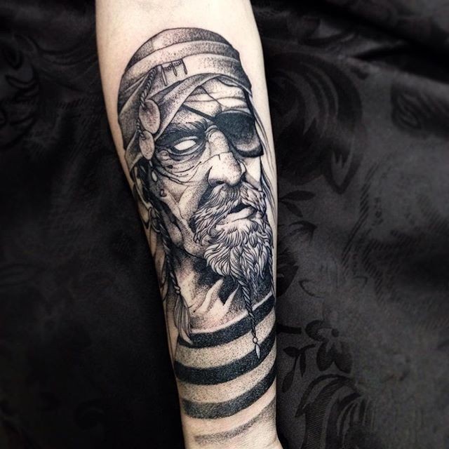 Typical black ink forearm tattoo of sailor portrait