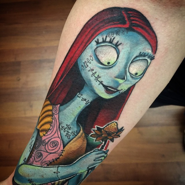 Typical cartoon style colored forearm tattoo of Nightmare before Christmas female hero