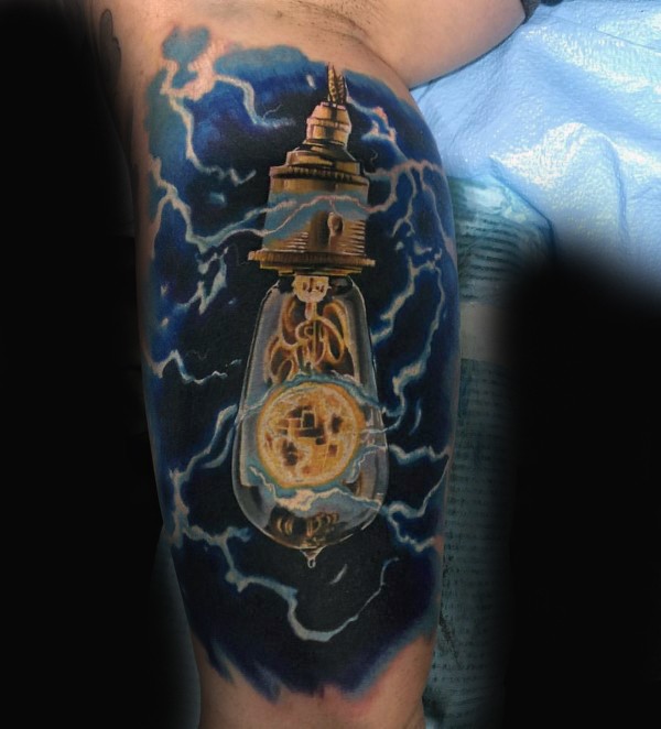 Typical colored arm tattoo of creepy bulb