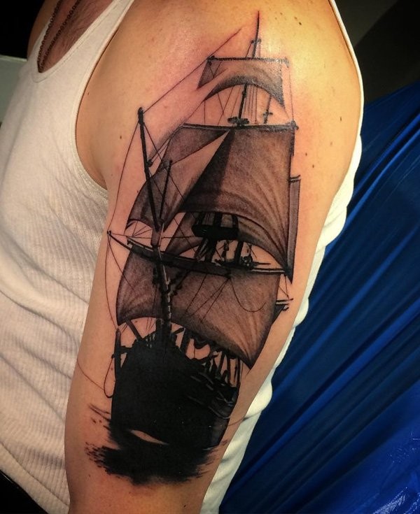 Typical colored shoulder tattoo of large and detailed sailing ship
