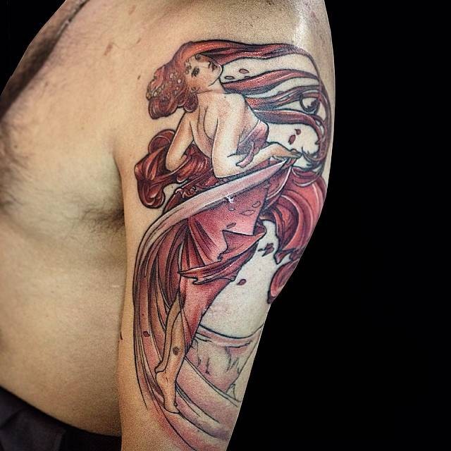 Typical illustrative style woman in red dress tattoo on shoulder
