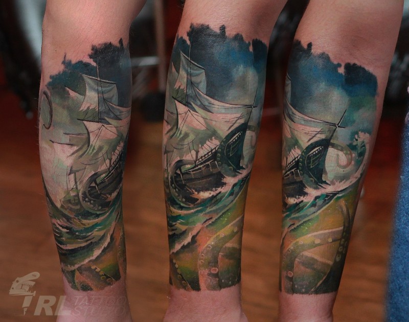 Typical multicolored arm tattoo of sailing ship with big waves