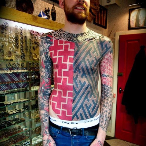 Typical multicolored geometric style tattoo on chest