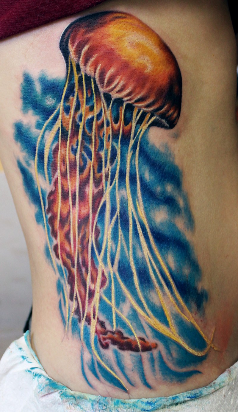Unbelievable colored massive realistic jelly-fish tattoo on whole back
