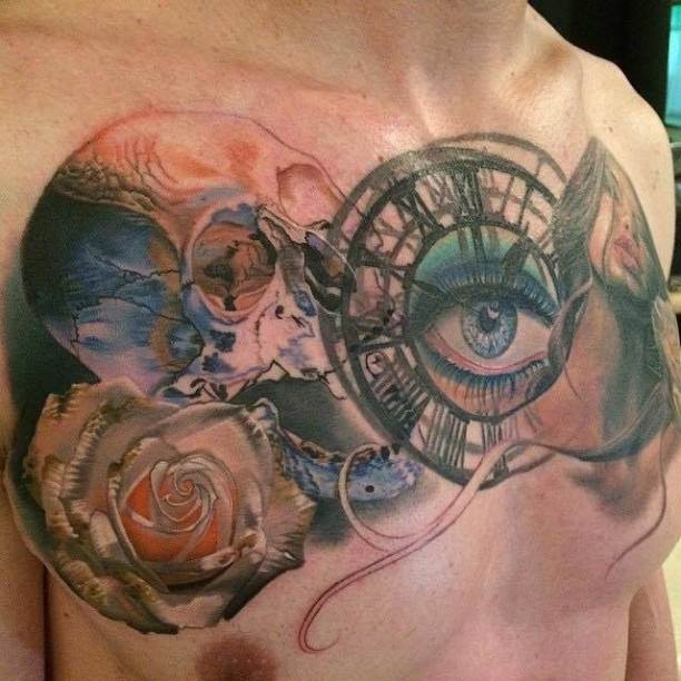 Unbelievable looking colored chest tattoo of human skull with rose and woman