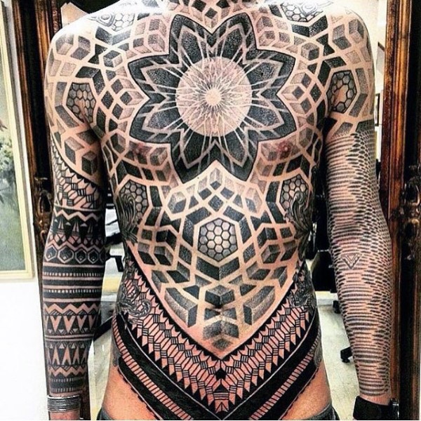 Unbelievable multicolored whole chest and belly tattoo of various old tribes ornaments