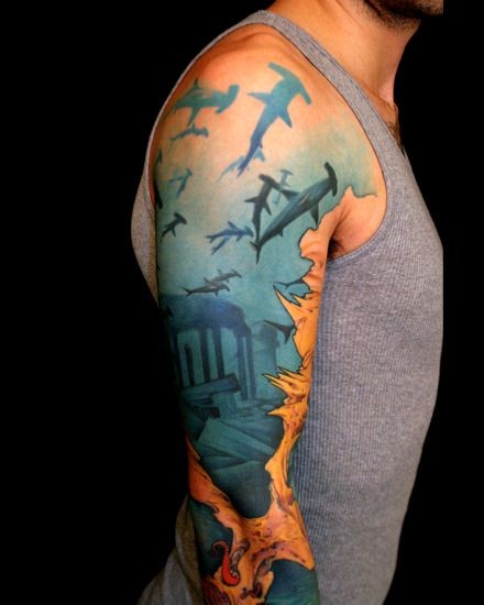 Under sea with hammerhead sharks tattoo on half sleeve