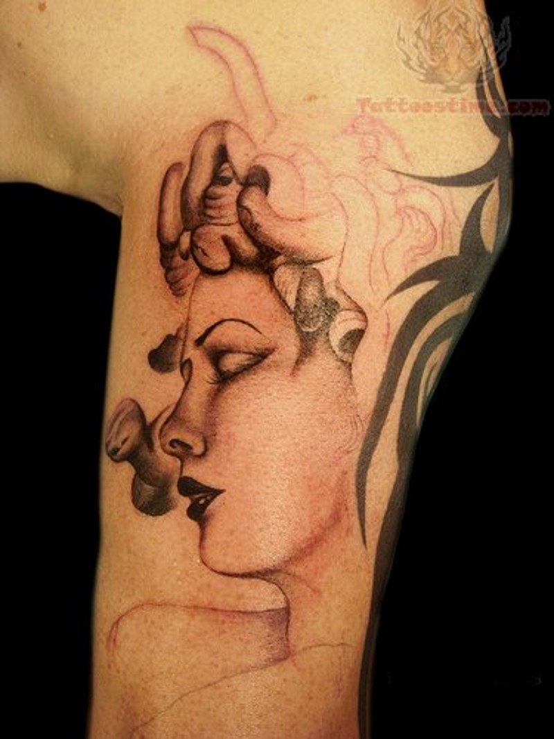 Unfinished beautiful looking arm tattoo of Medusa head