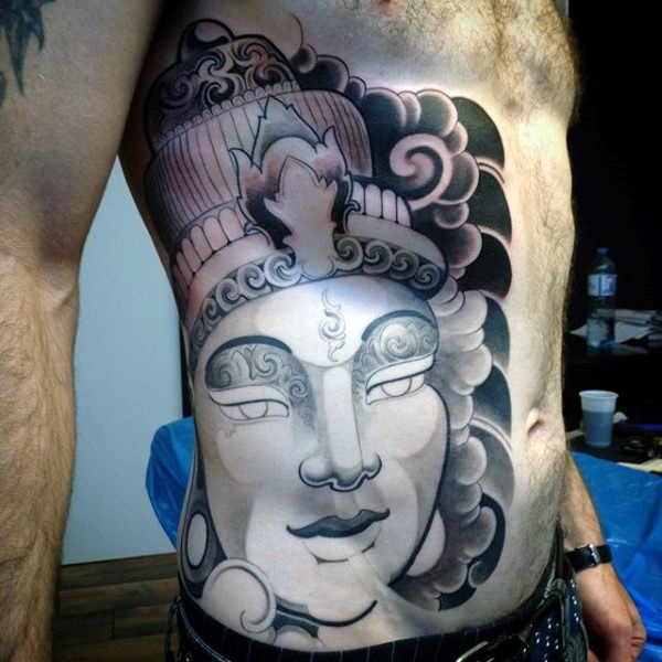 Unfinished Hinduism style Buddha statue tattoo on side