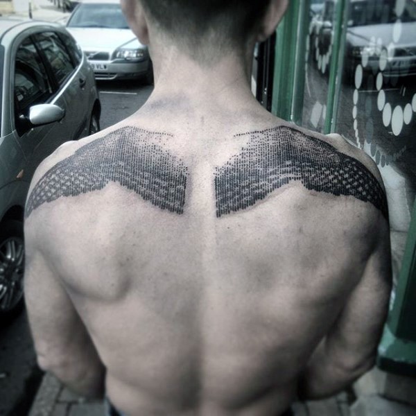 Unique black ink engraving style upper back tattoo of eagle wings