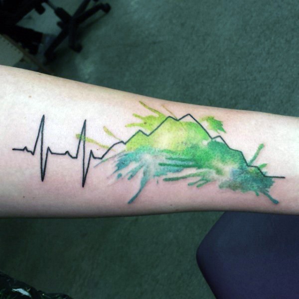 Unique black ink heart rhythm with colored mountain tattoo on hand
