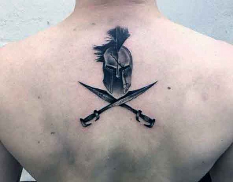 Unique black ink upper back tattoo of Spartan warrior helmet and crossed swords
