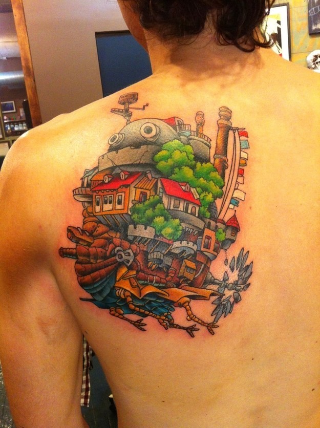 Unique colored funny cartoon style upper back tattoo of fantasy flying house-ship