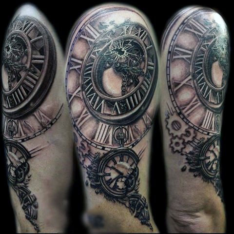 Unique painted very realistic colored old broken clock tattoo on arm