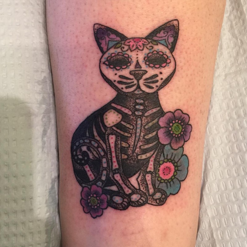 Illustrative style colored arm tattoo of Mexican traditional cat with flowers