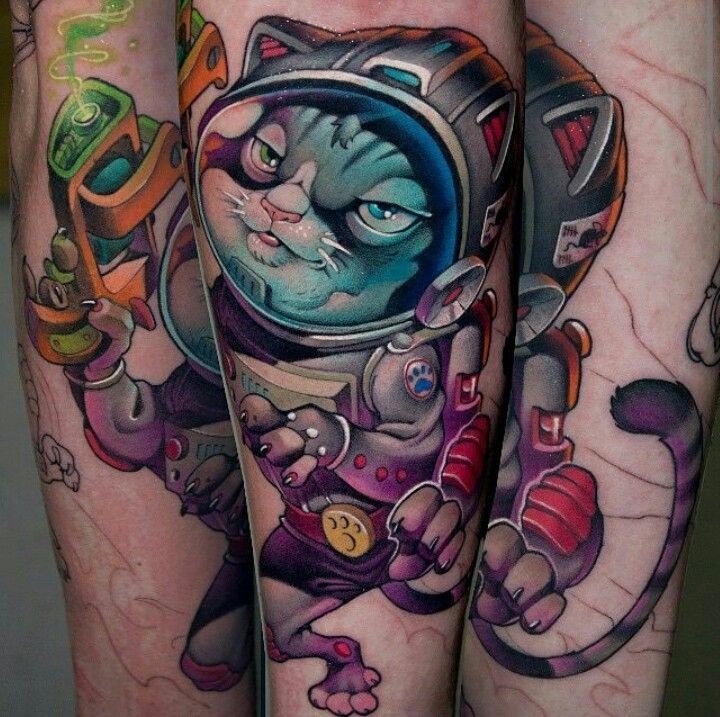 New school style colored arm tattoo of evil space cat