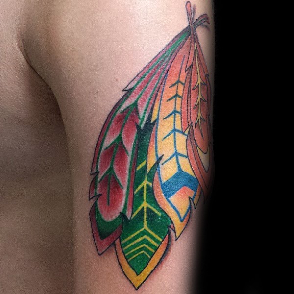 Illustrative style colored shoulder tattoo of multicolored feather