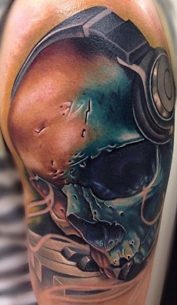 New school style colored shoulder tattoo of human skull with headset