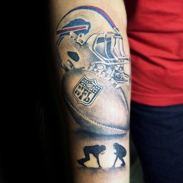 Illustrative style colored arm tattoo of American game helmet with ball