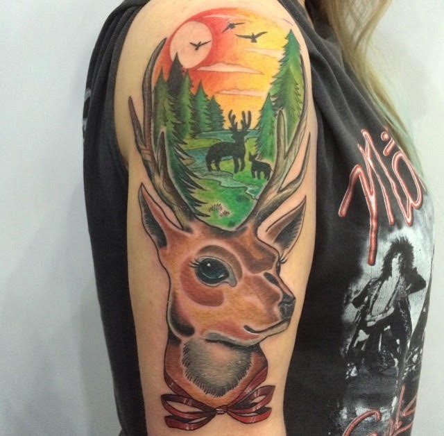 Illustrative style colored shoulder tattoo of deer stylized with beautiful picture