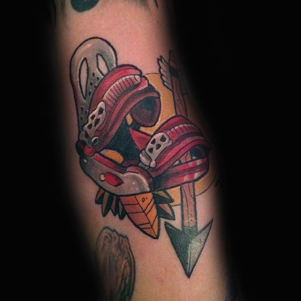 New school style colored arm tattoo of  snowboarders gear combined with arrow