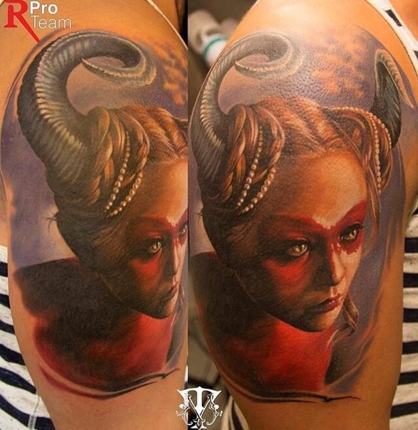 New school style colored shoulder tattoo of devils woman with jewelry