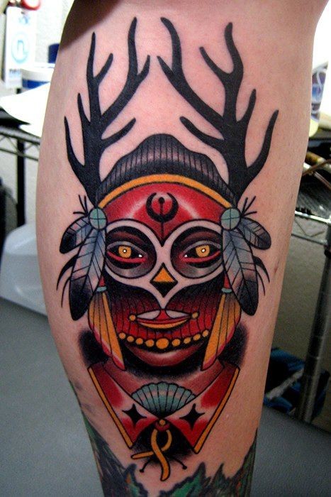 New school style colored leg tattoo of Indian mask with horns