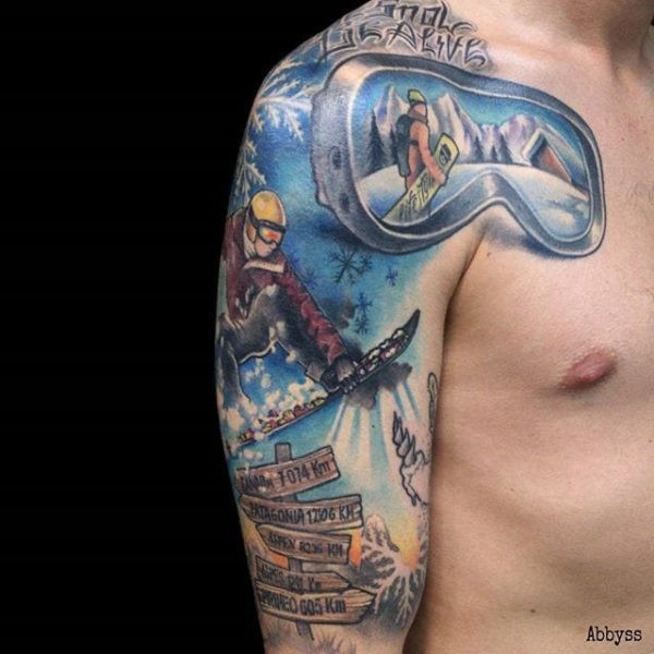 Illustrative style colored shoulder tattoo of snowboarder with glasses and road sign