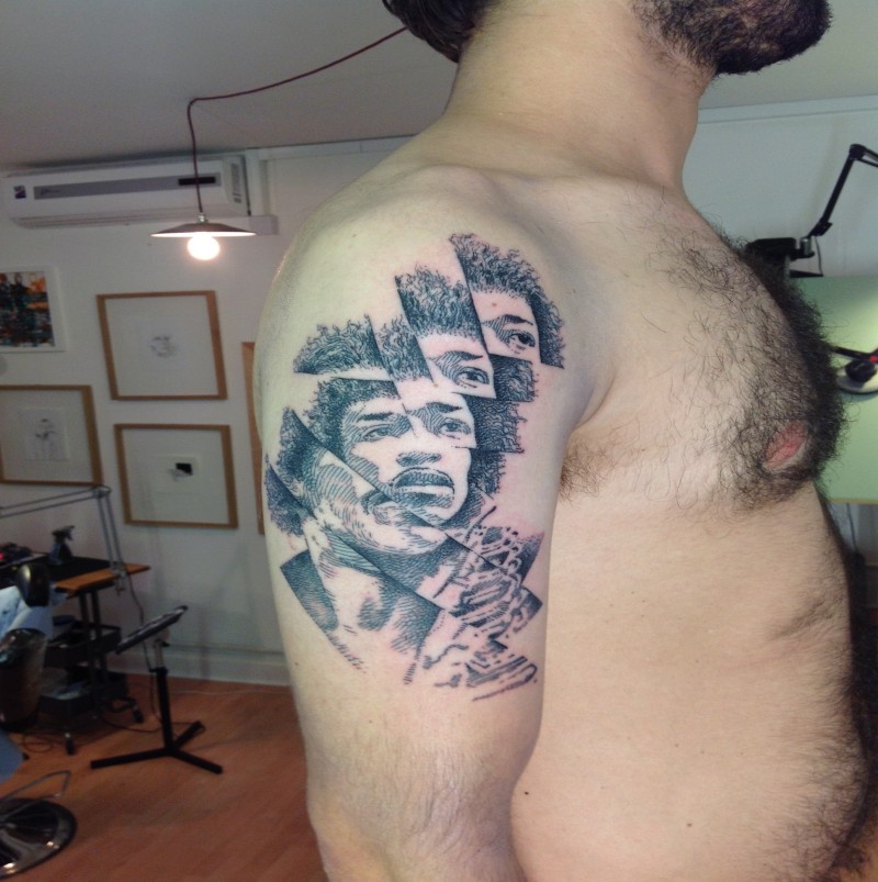 New school style colored shoulder tattoo of Jimmy Hendrix face