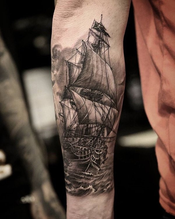 Illustrative style colored arm tattoo of large pirate sailing ship