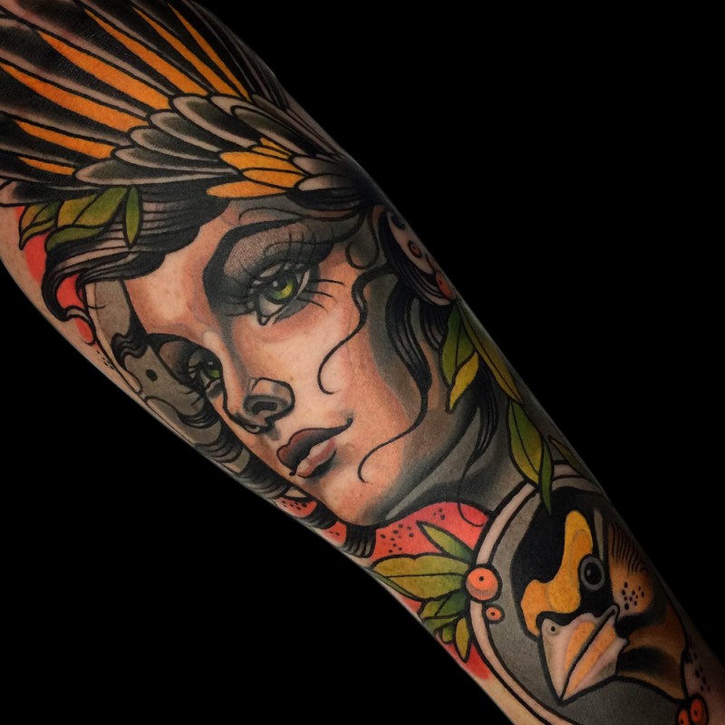 New school style colored forearm tattoo of beautiful woman with bird