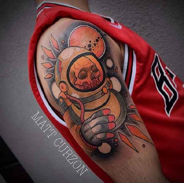 Illustrative style colored shoulder tattoo of skeleton astronaut