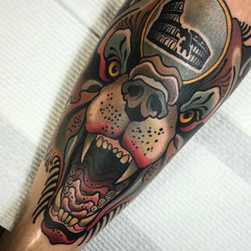 New school style colored leg tattoo of evil bear stylized with old house