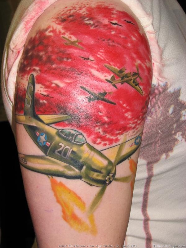 Illustrative style colored shoulder tattoo of WW2 planes