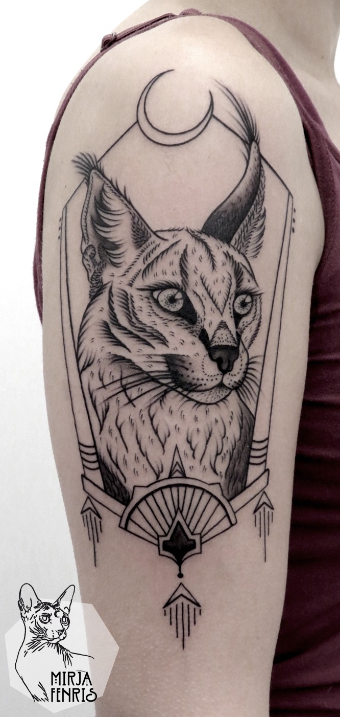Illustrative style colored shoulder tattoo of wild cat with moon
