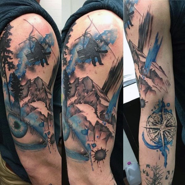 Illustrative style colored shoulder tattoo of mountains with snowboarder