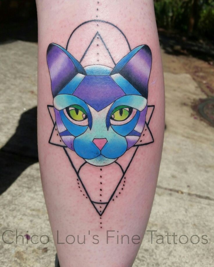 New school style colored leg tattoo of cat head with geometrical figures