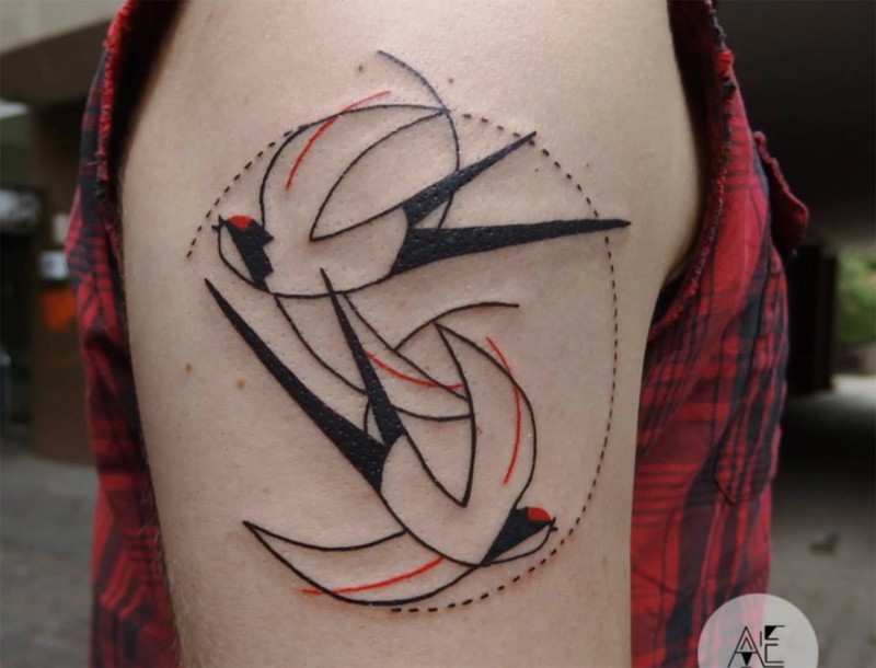 Illustrative style colored shoulder tattoo of flying birds