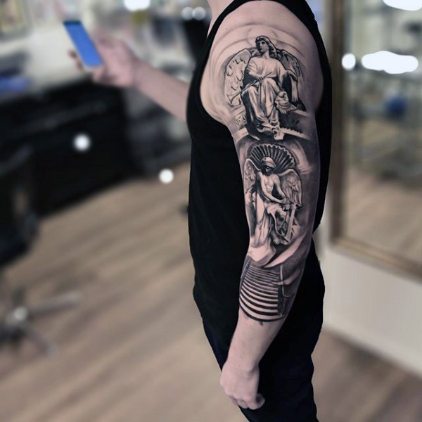 Unusual black and white sleeve tattoo of various angel statues