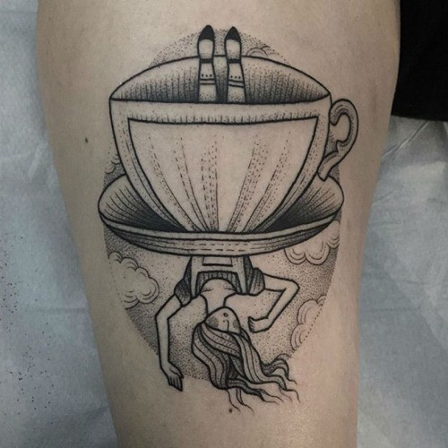 Unusual black and white thigh tattoo of woman in cup shaped dress