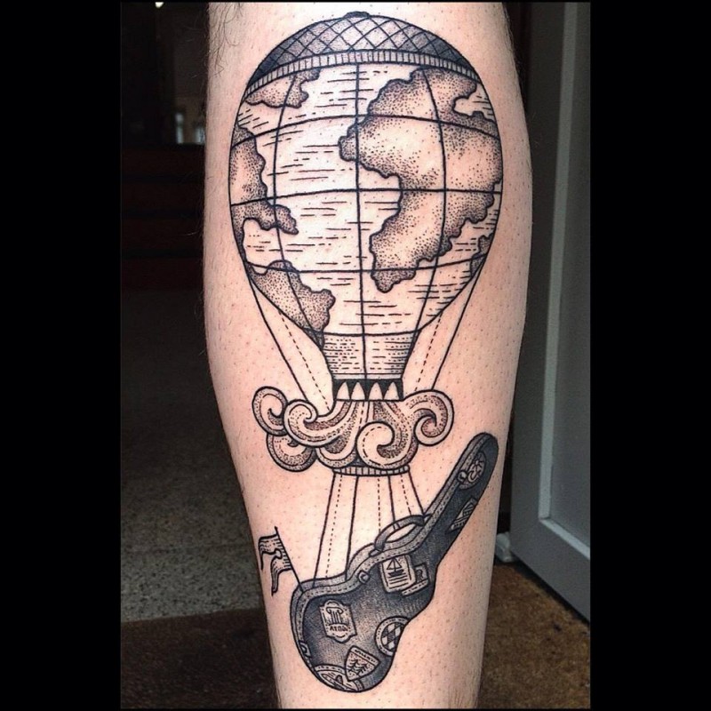 Unusual combined black ink balloon stylized with world map and and guitar case
